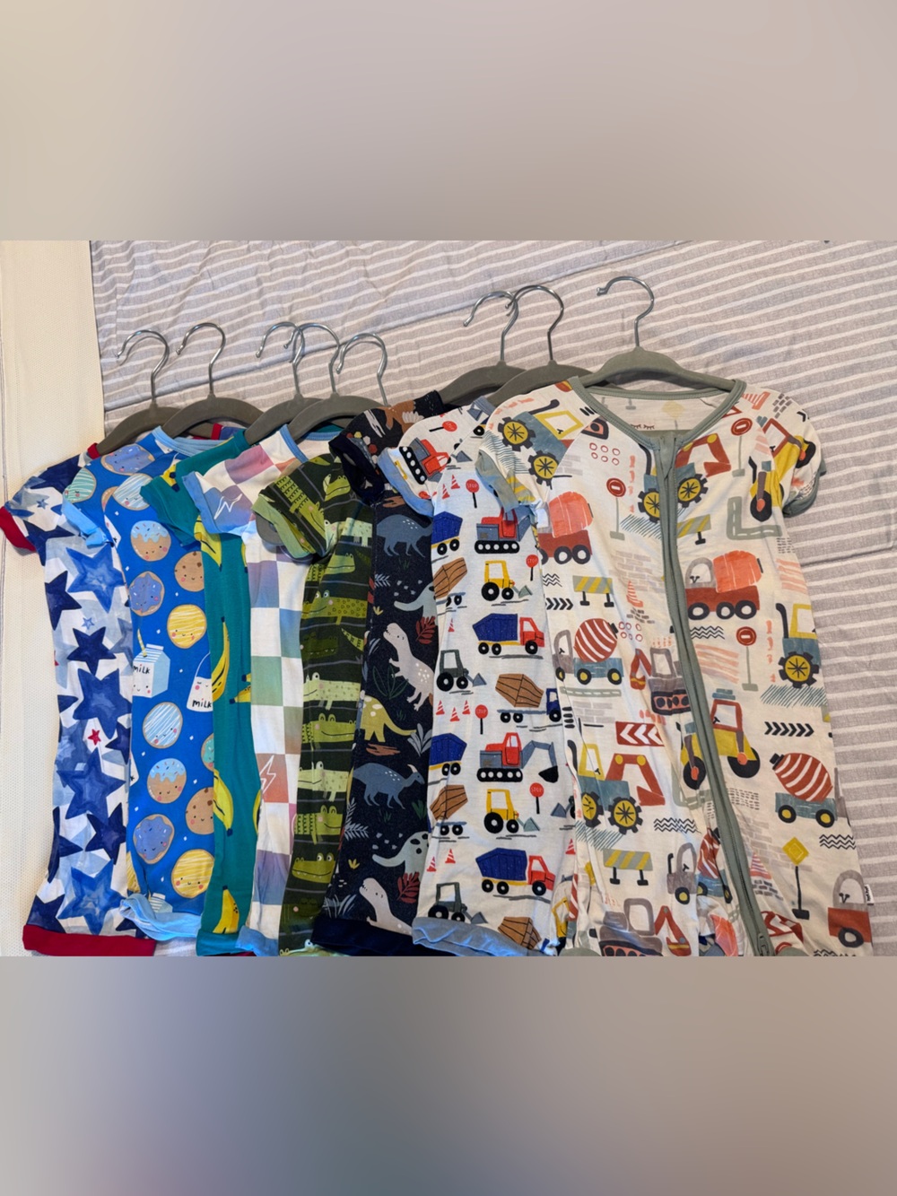 8 shorty rompers from little sleepies.